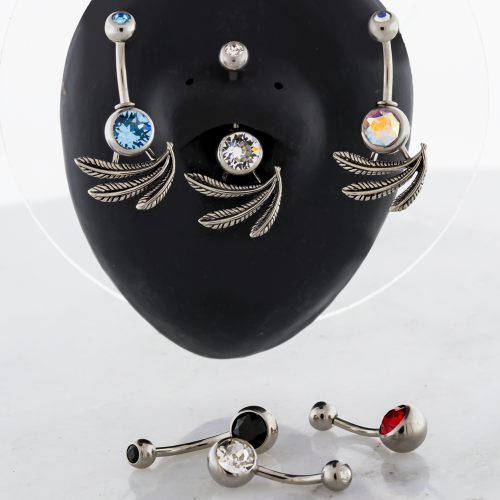 STEEL NAVEL RING W/ ABSTRACT FEATHERS