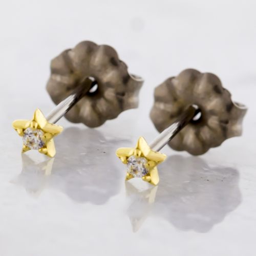 TITANIUM EARRING STUD WITH 18KT GOLD STAR AND GEM