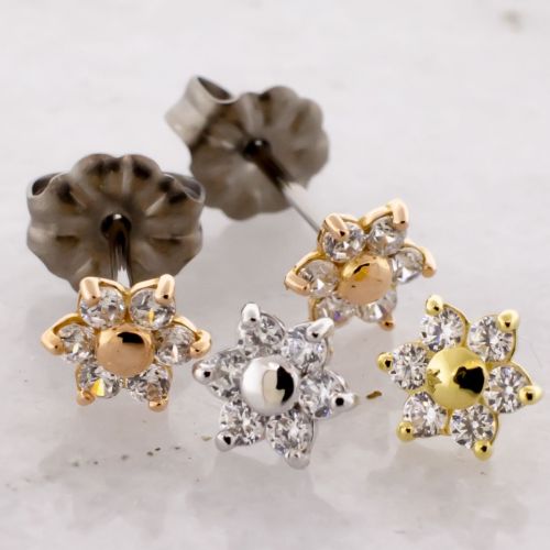 TITANIUM EARRING STUD WITH 18KT YELLOW GOLD PRONG SET FLOWER