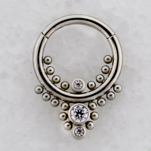 TITANIUM HINGED RING WITH BEADED BALLS AROUND GEMS