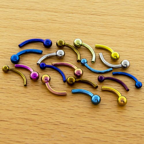 Titanium Threadless Curved Barbell - 16G-18G w/Fixed Ball